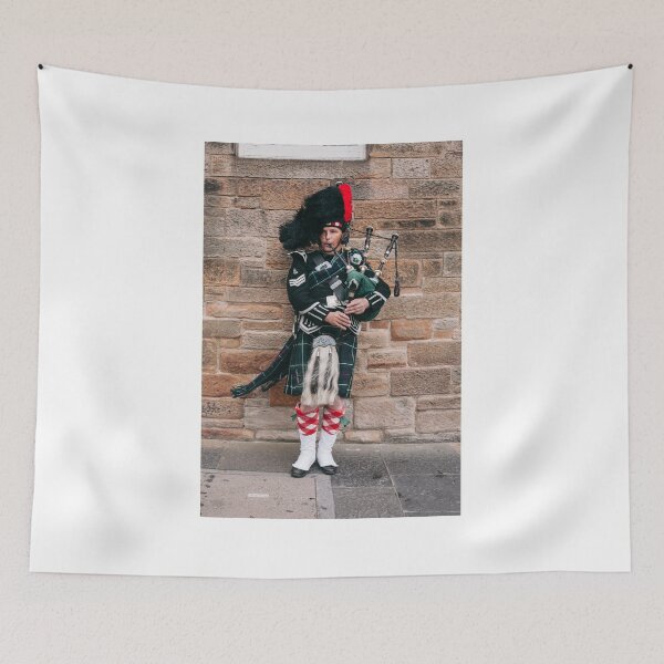 Item preview, Traditional Scottish bagpiper playing in full Highland dress on the Royal Mile designed and sold by Creative photos and art.