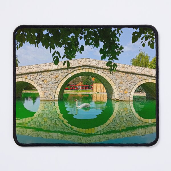 Item preview, White swan under the arch bridge is floating on the calm lake designed and sold by Levorr.