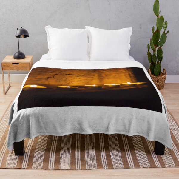 Item preview, Row Of Tea Light Candles On A Rustic Wall Emit Warm Amber Glow At Night designed and sold by Nmallia.
