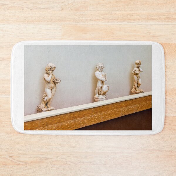 Item preview, Three Stone Cherub Statues Aligned Along White Wall as Decorative Indoor Sculpture Display designed and sold by Nmallia.