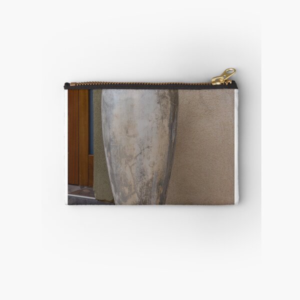 Item preview, Weathered Large Ceramic Vase on Stone Pedestal by Exterior Wall for Outdoor Decor designed and sold by Nmallia.