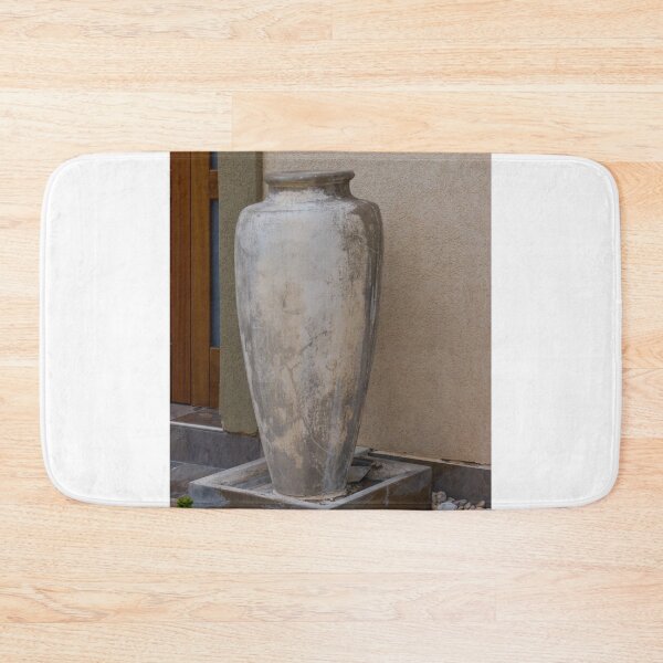 Item preview, Weathered Large Ceramic Vase on Stone Pedestal by Exterior Wall for Outdoor Decor designed and sold by Nmallia.