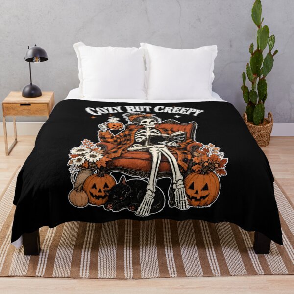 Item preview, Cozy But Creepy Skeleton Sitting In Chair With Pumpkins Flowers designed and sold by MarlaMaloneShop.