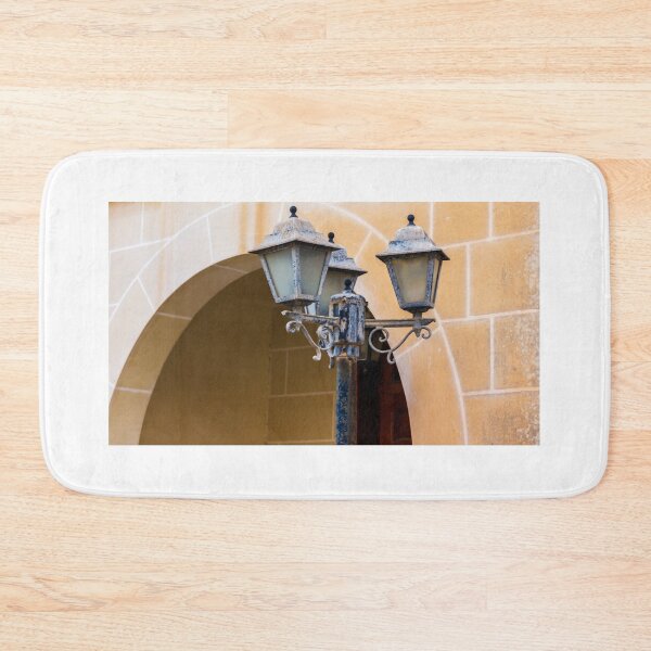 Item preview, Vintage Street Lamp Post With Three Lanterns Against a Warm Stone Archway Setting designed and sold by Nmallia.