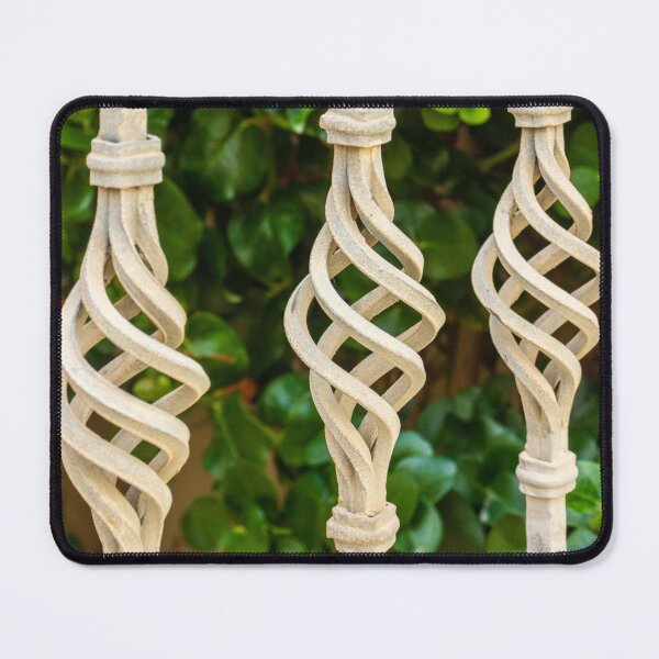 Item preview, Decorative Twisted Iron Fence Bars With Vertical Rods Over Lush Green Hedge Behind Wall designed and sold by Nmallia.