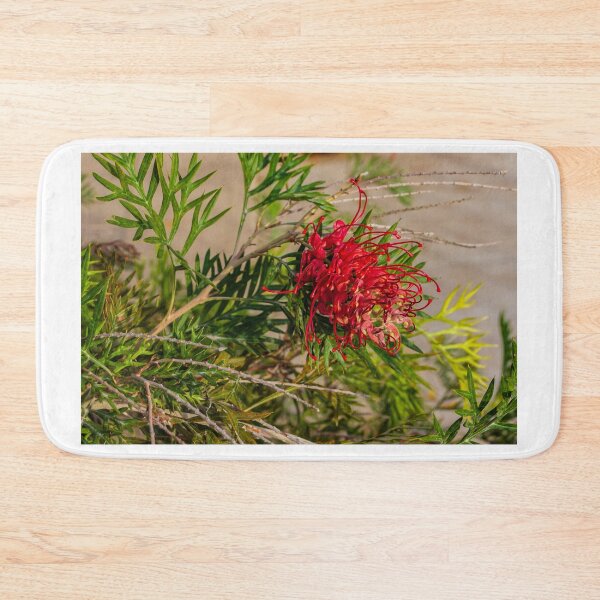 Item preview, Vibrant Red Protea Flower Among Green Foliage in a Natural Outdoor Setting designed and sold by Nmallia.
