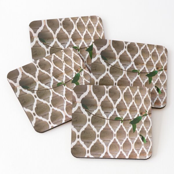 Item preview, Vines Climb Through White Lattice Fence Against Aged Brick Wall In Sunlight designed and sold by Nmallia.