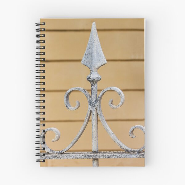 Item preview, Decorative Wrought Iron Fence Finial With Scrollwork And Spear Tops Against Yellow Wall designed and sold by Nmallia.
