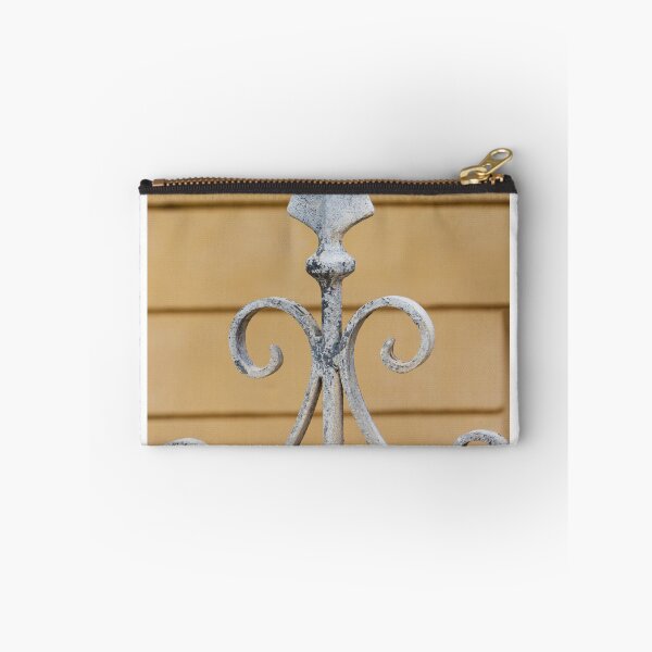Item preview, Decorative Wrought Iron Fence Finial With Scrollwork And Spear Tops Against Yellow Wall designed and sold by Nmallia.