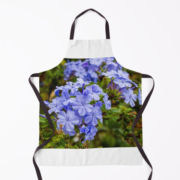 Item preview, Vibrant Blue Plumbago Flowers Blooming Cluster in Lush Garden Setting designed and sold by Nmallia.