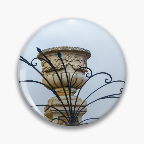 Item preview, Ornate Black Iron Fencing Surrounding a Stone Urn On a Sunlit Mediterranean Roofline designed and sold by Nmallia.