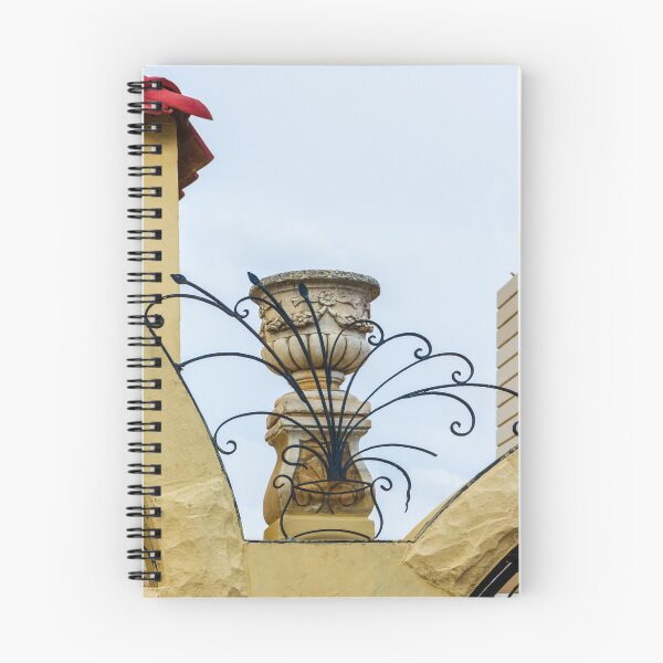 Item preview, Ornate Black Iron Fencing Surrounding a Stone Urn On a Sunlit Mediterranean Roofline designed and sold by Nmallia.