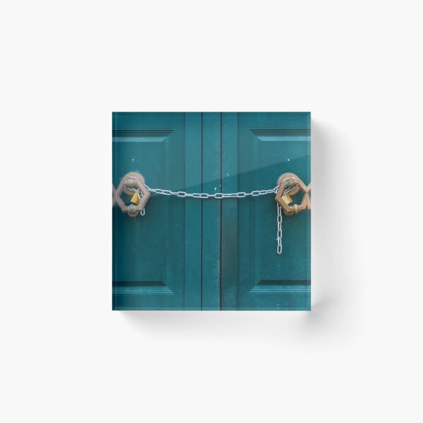 Item preview, Teal Double Doors Secured With Chains And Padlocks Across Panels Of A Metal Gate designed and sold by Nmallia.
