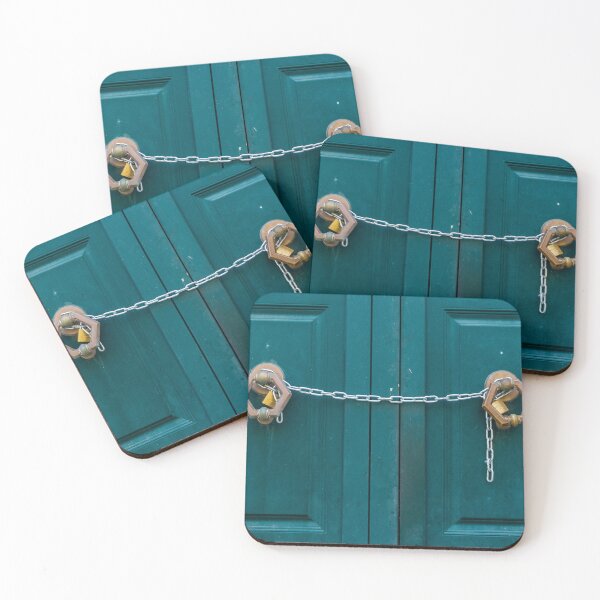 Item preview, Teal Double Doors Secured With Chains And Padlocks Across Panels Of A Metal Gate designed and sold by Nmallia.