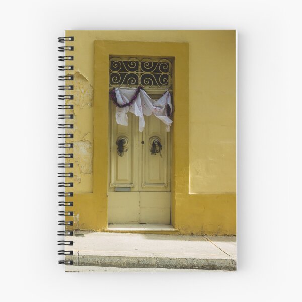 Item preview, Bright Yellow Facade With Old Double Door, Torn Paper, and Festive Garland designed and sold by Nmallia.