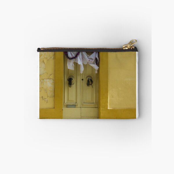 Item preview, Bright Yellow Facade With Old Double Door, Torn Paper, and Festive Garland designed and sold by Nmallia.