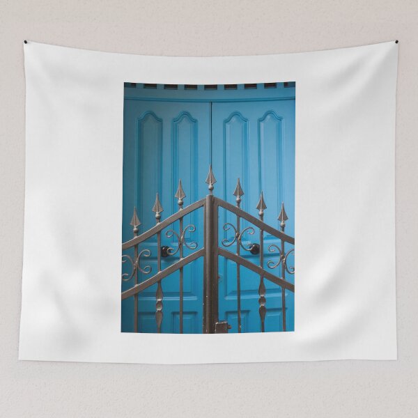 Item preview, Bold Blue Doors Behind Ornate Black Iron Fence Create Striking Street Scene designed and sold by Nmallia.