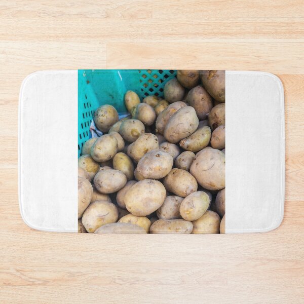 Item preview, Fresh Brown Potatoes in a Green Plastic Crate Ready for Market or Kitchen Use designed and sold by Nmallia.