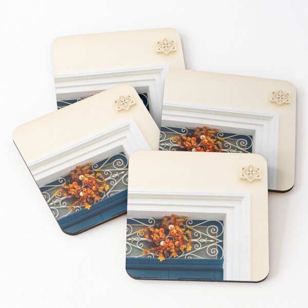 Item preview, Autumn Wreath Adorns Blue Door With White Ornate Grille On Sunlit Wall designed and sold by Nmallia.