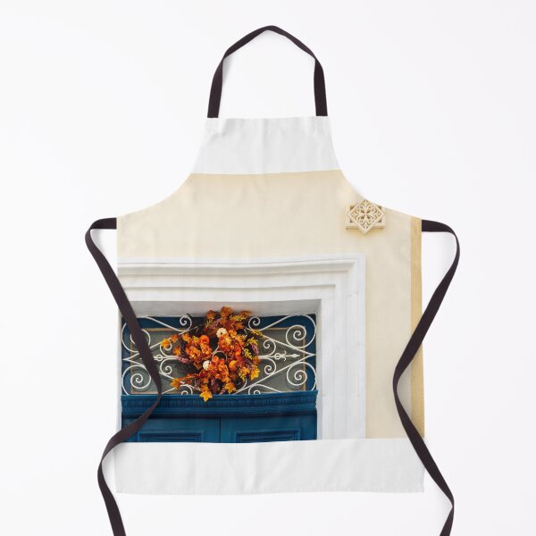 Item preview, Autumn Wreath Adorns Blue Door With White Ornate Grille On Sunlit Wall designed and sold by Nmallia.