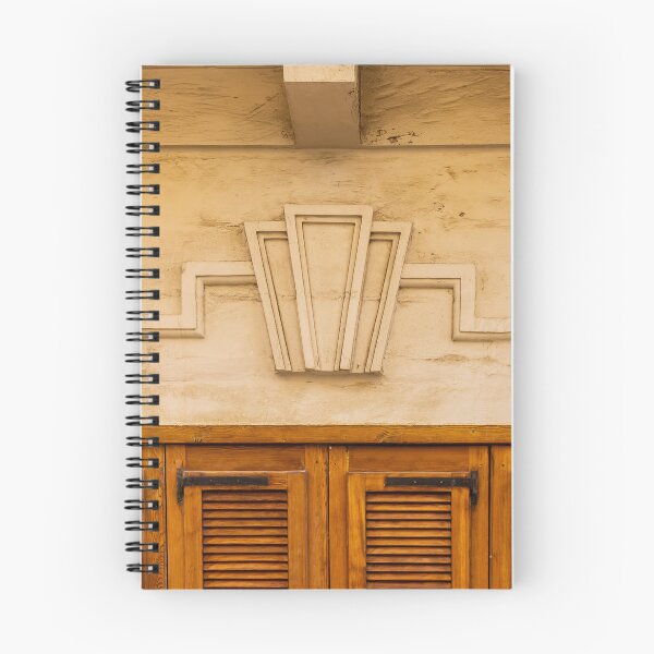 Item preview, Art Deco Stone Motif Above Warm Wooden Shuttered Door on Cream Facade, Historic Urban Architecture Detail designed and sold by Nmallia.