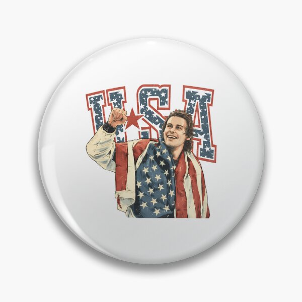 Item preview, Jack Hughes Usa Hockey - Jack Hughes Missing Teeth Usa Hockey Jack Hughes Usa Hockey Golden Goal Champion 2026 designed and sold by SANVUDesigns.