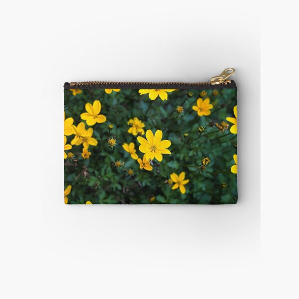 Item preview, Bright yellow Bidens flowers blooming in a garden designed and sold by RastislavS.