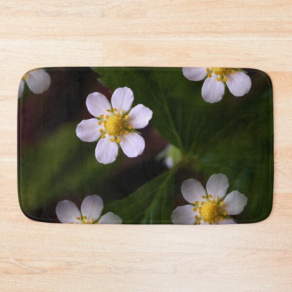 Item preview, Strawberry flowers on the background of green leaves close-up designed and sold by IgorKovalenko.