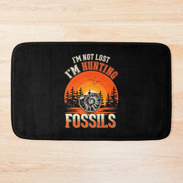 Item preview, Retro Ammonite Fossil Hunting Sunset Graphic designed and sold by ballyyksjod.