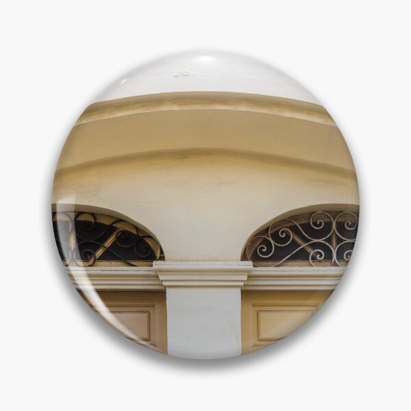 Item preview, Double Wooden Doors Under Archway With Decorative Iron Grilles On Cream Facade designed and sold by Nmallia.
