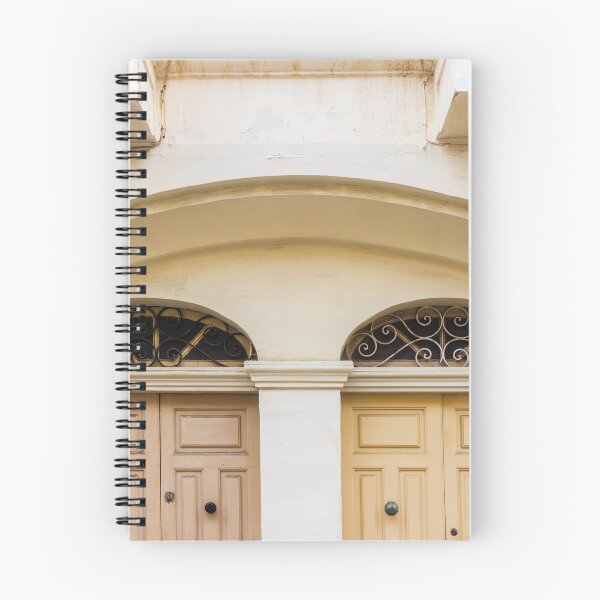 Item preview, Double Wooden Doors Under Archway With Decorative Iron Grilles On Cream Facade designed and sold by Nmallia.