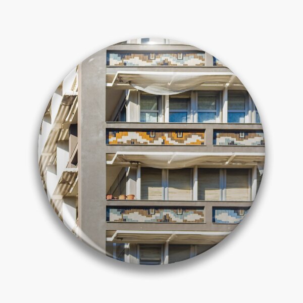 Item preview, Modern Residential Building With Colorful Balcony Tiles And White Sun Shades Under Blue Sky designed and sold by Nmallia.