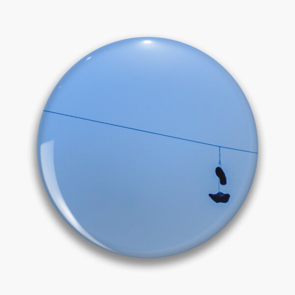 Item preview, Shoes Hanging on a Wire Against a Clear Blue Sky in Open Air designed and sold by Nmallia.