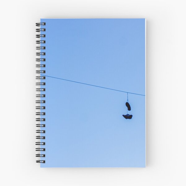 Item preview, Shoes Hanging on a Wire Against a Clear Blue Sky in Open Air designed and sold by Nmallia.
