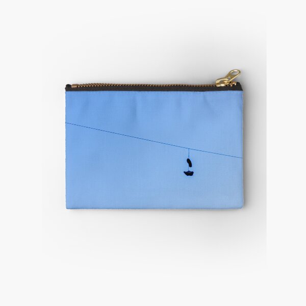 Item preview, Shoes Hanging on a Wire Against a Clear Blue Sky in Open Air designed and sold by Nmallia.