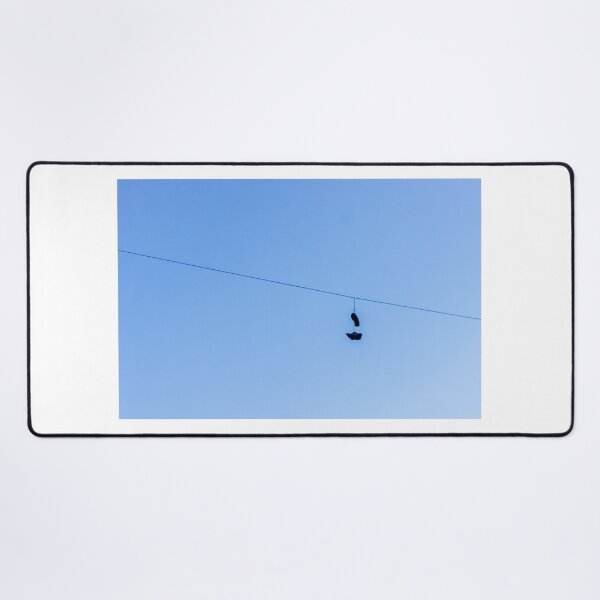 Item preview, Shoes Hanging on a Wire Against a Clear Blue Sky in Open Air designed and sold by Nmallia.