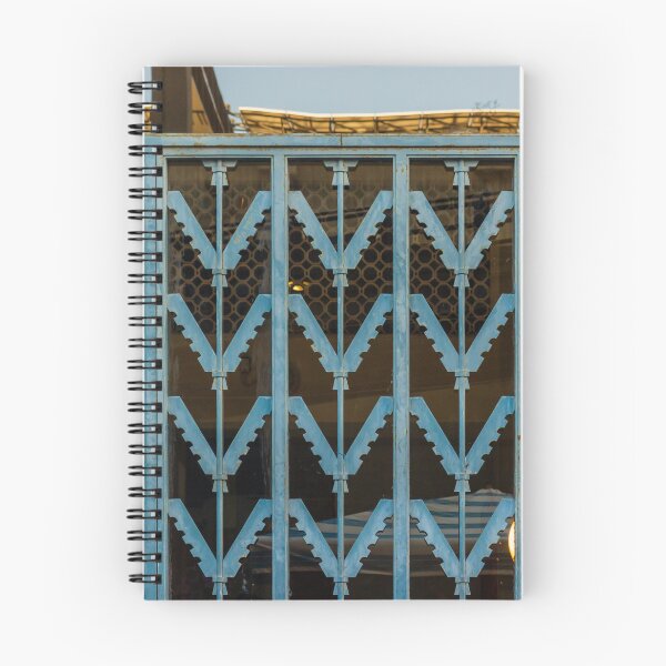 Item preview, Blue Metal Security Gate With Zigzag Pattern In Front Of Glass Window designed and sold by Nmallia.