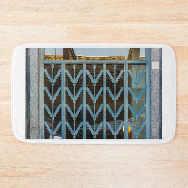 Item preview, Blue Metal Security Gate With Zigzag Pattern In Front Of Glass Window designed and sold by Nmallia.