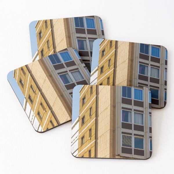 Item preview, Modern Office Building Facade With Grid Windows And Sandstone Exterior Under Clear Blue Sky designed and sold by Nmallia.