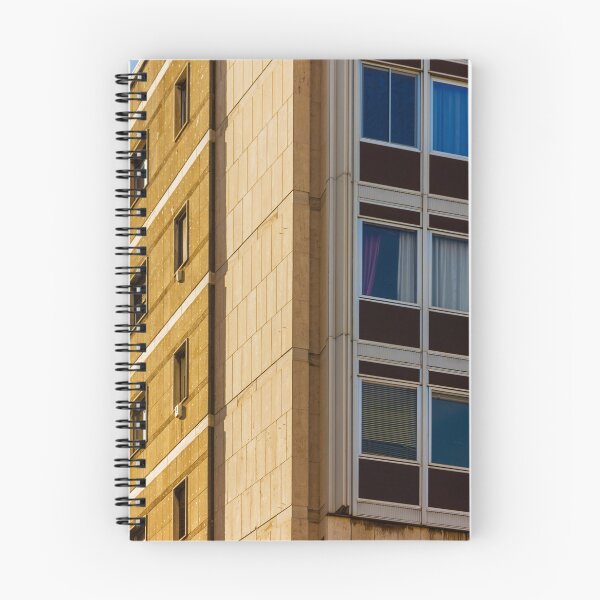Item preview, Modern Office Building Facade With Grid Windows And Sandstone Exterior Under Clear Blue Sky designed and sold by Nmallia.