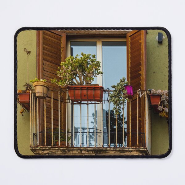 Item preview, Charming Balcony With Open Wooden Shutters and Potted Plants on a Green City Building designed and sold by Nmallia.