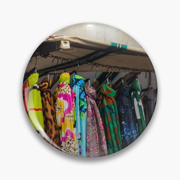 Item preview, Pigeon Perches On Market Stall Roof Above Vibrant Colorful Scarves And Fabrics designed and sold by Nmallia.