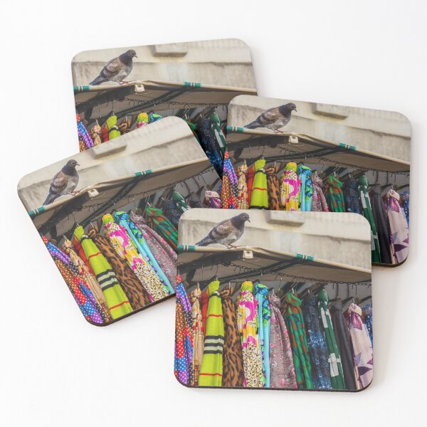 Item preview, Pigeon Perches On Market Stall Roof Above Vibrant Colorful Scarves And Fabrics designed and sold by Nmallia.