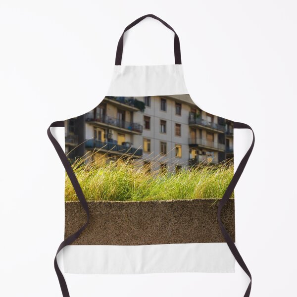 Item preview, Lush Grass On Concrete Wall With Urban Apartment Building Backdrop At Dusk designed and sold by Nmallia.