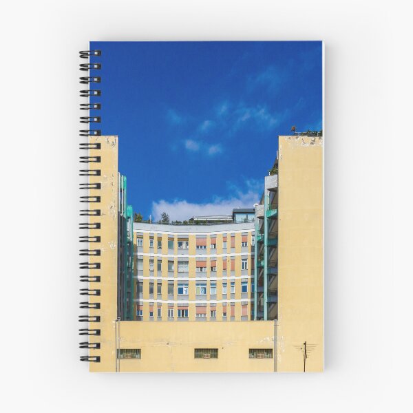 Item preview, Yellow Building With Curved Center Facade And Rooftop Antennas Under Bright Blue Sky designed and sold by Nmallia.