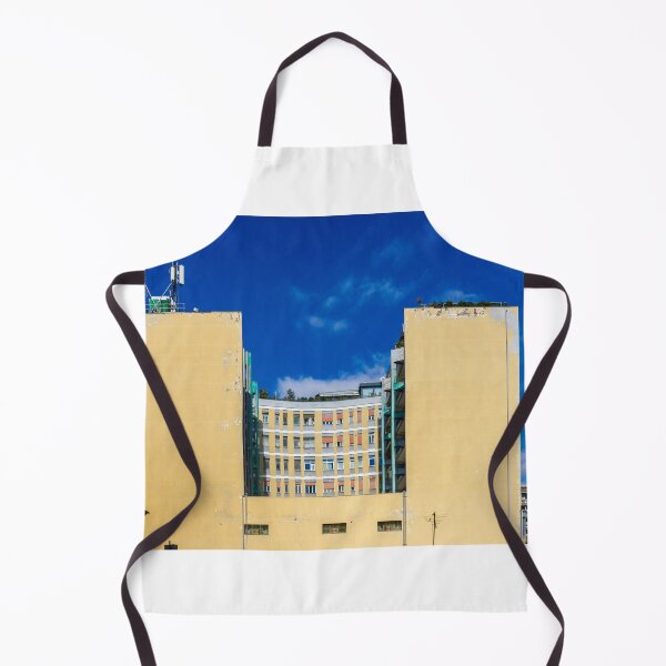 Item preview, Edificio amarillo con fachada central curva y antenas en la azotea bajo un cielo azul brillante. designed and sold by Nmallia.