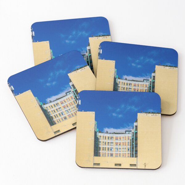 Item preview, Yellow Building With Curved Center Facade And Rooftop Antennas Under Bright Blue Sky designed and sold by Nmallia.