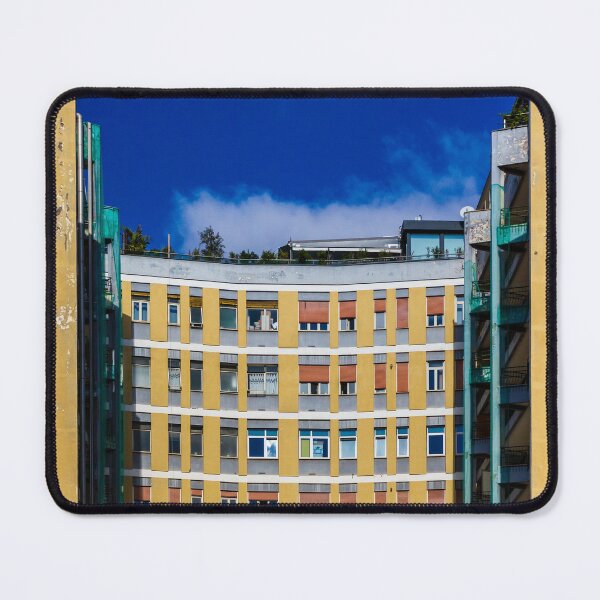 Item preview, Curved Yellow Apartment Building With Bright Windows Against Deep Blue Sky designed and sold by Nmallia.
