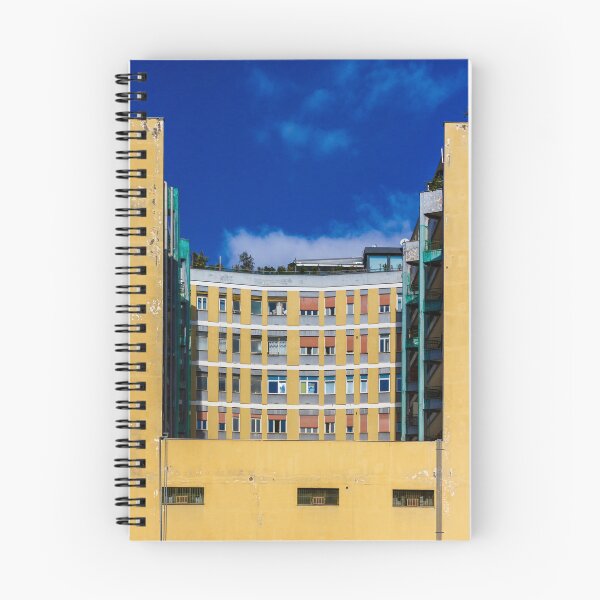 Item preview, Curved Yellow Apartment Building With Bright Windows Against Deep Blue Sky designed and sold by Nmallia.