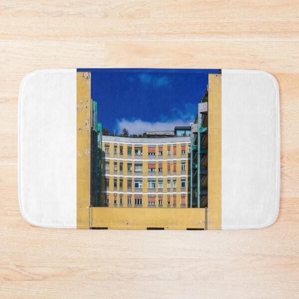 Item preview, Curved Yellow Apartment Building With Bright Windows Against Deep Blue Sky designed and sold by Nmallia.